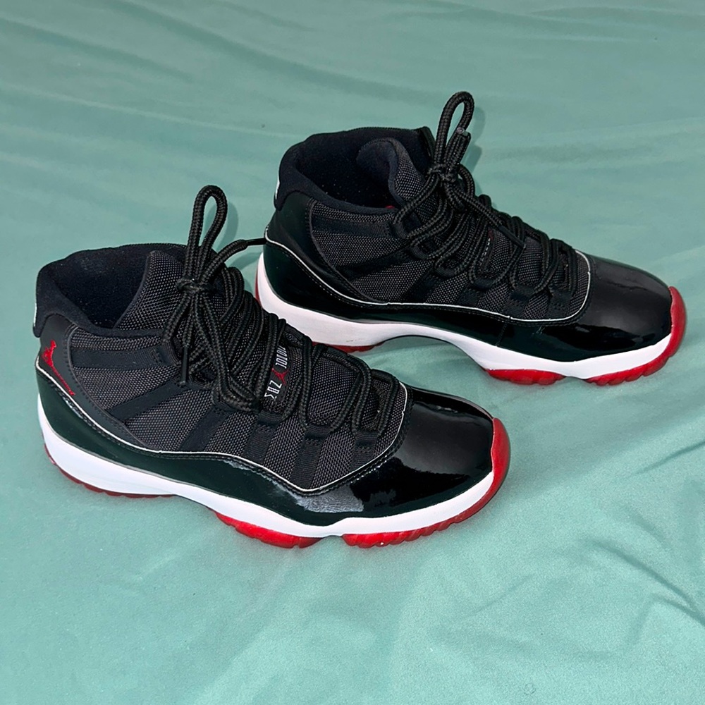 Bred Jordan 11s - Size 8.5 in Men’s / Size 10 in Women’s